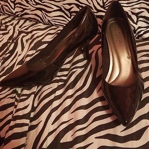 Black leather pointed toe heels